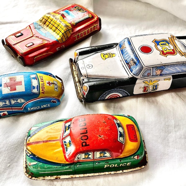 Four Tin Litho Toy Cars Made In Japan – Each One Sold Individually