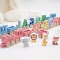 Baby’s First Train | Personalized Wooden Name Toy | Custom Magnetic Train set with Animals | Unique Baby’s First Christmas or Shower Gift product logo
