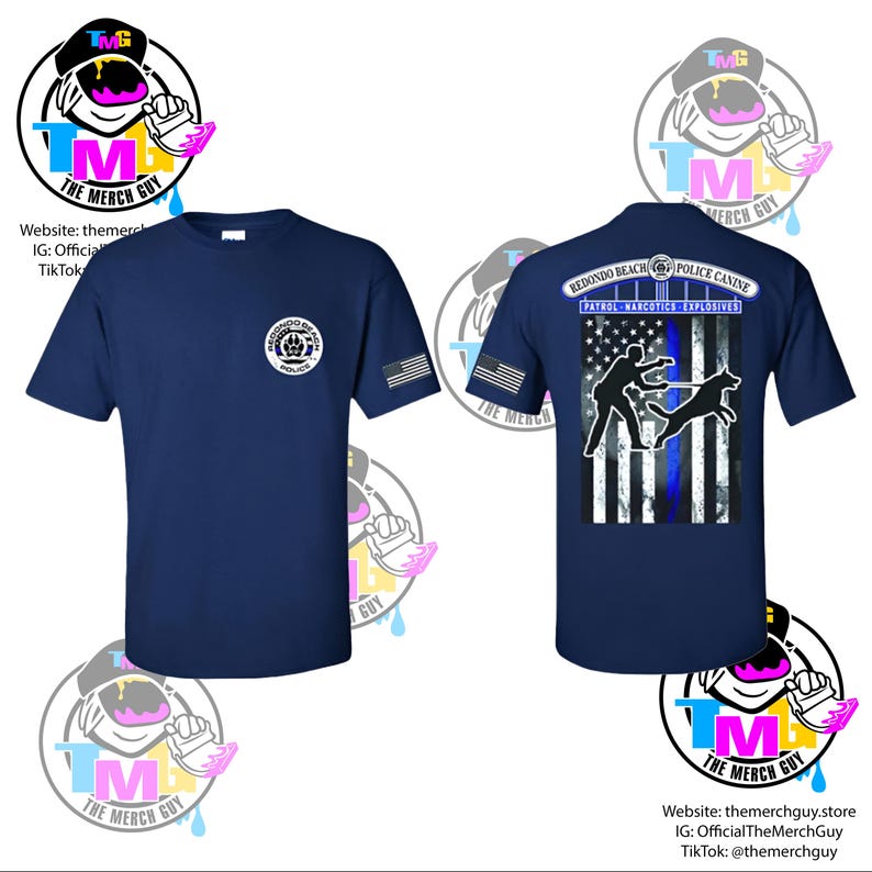 May include: Navy blue t-shirts with a design featuring the Redondo Beach Police Canine unit. The front of the shirt displays a badge and an American flag patch. The back features a graphic of a police officer and dog with the text "Redondo Beach Police Canine".