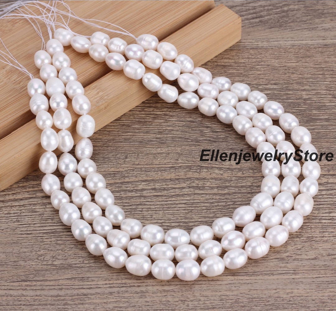 Perles d'eau douce disque blanc 10-15mm (4) (4 perles) main image 0