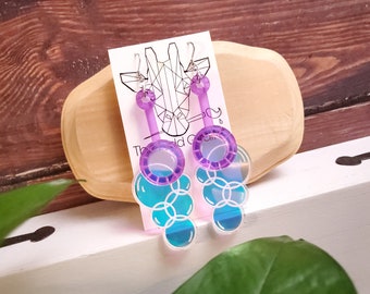 Bubble wand earrings. Purple. Laser engraved purple and holographic acrylic. Nostalgia, bubbles, childhood, summertime.
