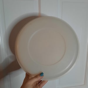 May include: A handmade wooden sign with the text "Welcome to our home" in a handwritten style. The sign is painted white with a dark stained frame. The sign measures approximately 12 inches wide and 8 inches tall.