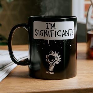 Calvin and Hobbes Black Ceramic Mug Calvin 2 sizes: I&#39;m significant!