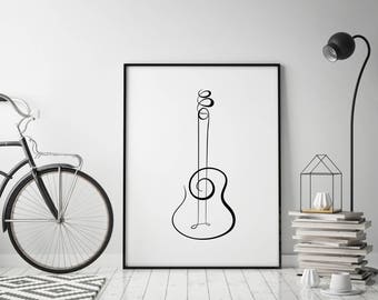 May include: Black and white line art print of a guitar on a white background in a black frame.