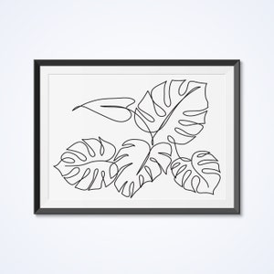 May include: A black and white line drawing of tropical leaves in a black frame. The leaves are drawn in a continuous line style.