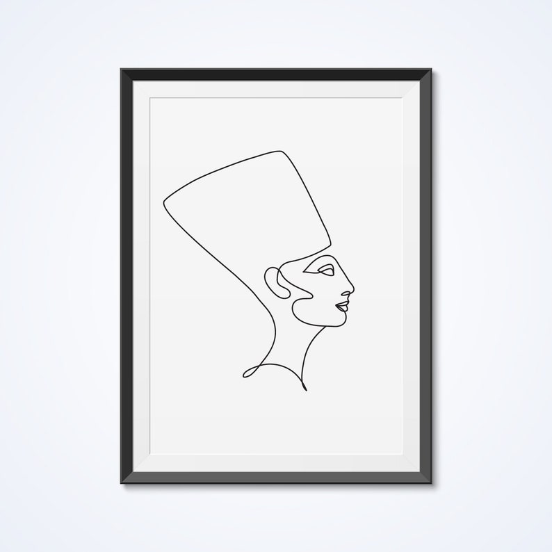 May include: Line art drawing of a woman wearing a headdress, in a black frame.