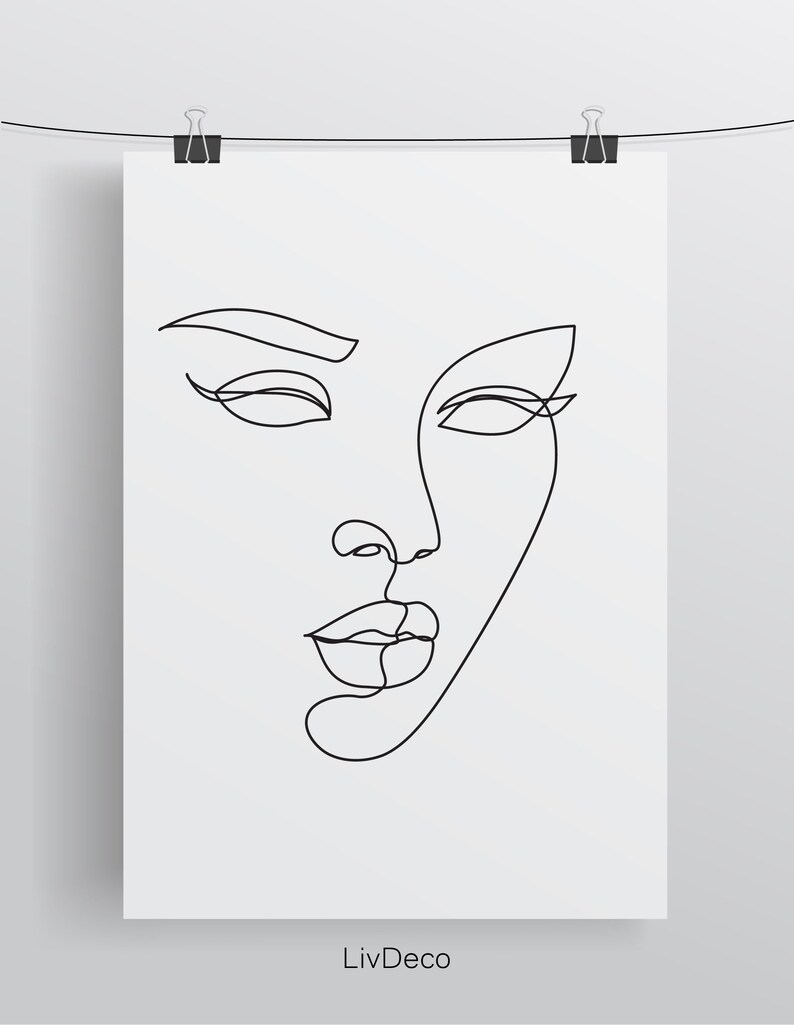May include: A black and white line drawing of a woman's face. The drawing is minimalist and features only the outline of the face, eyes, nose, and lips.