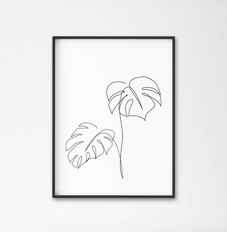 May include: A black and white line drawing of two tropical leaves in a minimalist style.