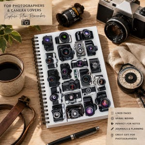 May include: A spiral-bound notebook featuring a cover pattern of various vintage and modern cameras. The notebook is surrounded by a film roll, a camera, a light meter, a brown leather strap, a mug, and a pen. Text on the cover reads: FOR PHOTOGRAPHERS & CAMERA LOVERS Capture. Plan. Remember.