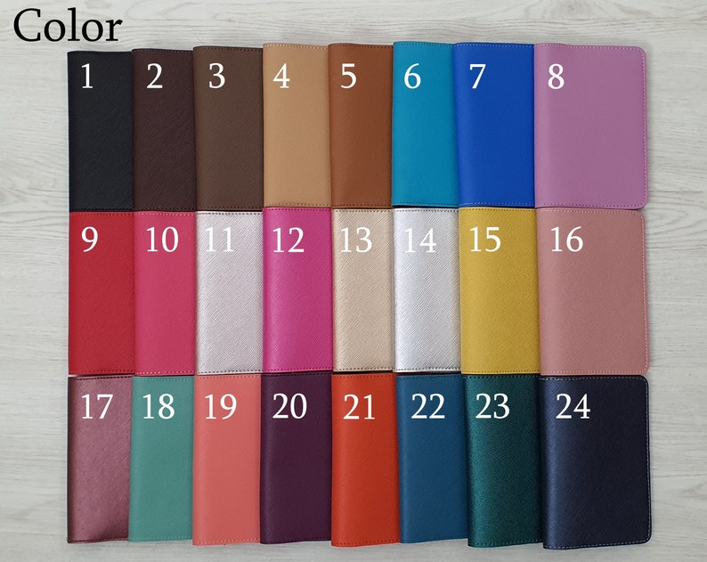 May include: A collection of 24 passport holders in various colors, arranged in a grid. The colors include black, brown, tan, blue, pink, and green. The word "Color" is at the top left corner, with numbers 1-24 labeling each passport holder.
