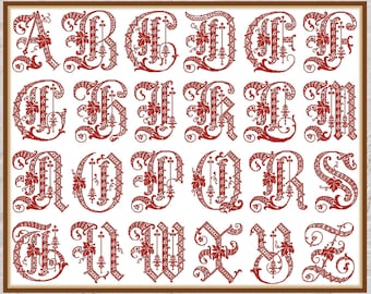May include: A framed alphabet chart with red letters in a decorative, old-fashioned font. Each letter is surrounded by a floral design.