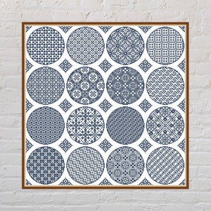 May include: A framed print with a white background and 16 blue circles, each with a different geometric pattern.