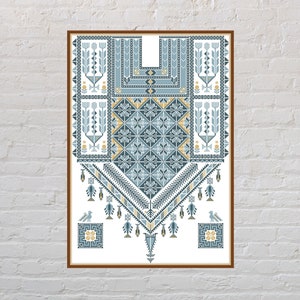 May include: A framed artwork featuring a geometric pattern in shades of blue and yellow. The design is reminiscent of traditional embroidery or textile art.