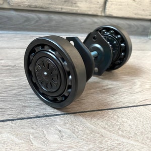 Metal Door Handles: Handcrafted. Elevate your doors with these original, painted metal door knob crafted from repurposed bearings.