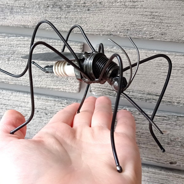 Metal sculpture mosquito. Mosquito statuette. Mosquito Spark Plug.