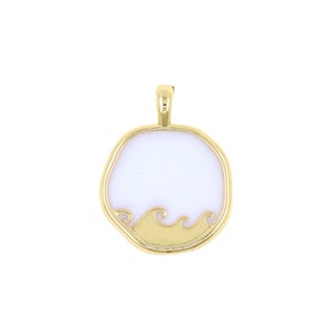 May include: Gold pendant with a white circular disc featuring a wave design.