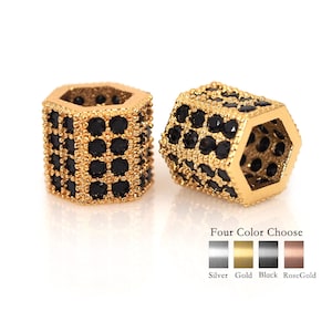May include: Two gold-toned hexagonal beads with black cubic zirconia stones. The beads are available in four colors: silver, gold, black, and rose gold.