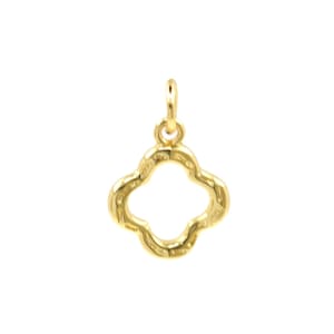 May include: A gold-colored clover-shaped charm with a small loop at the top for attaching to a necklace or bracelet. The charm has a four-leaf clover design with rounded edges and a smooth finish. The charm is isolated on a white background.