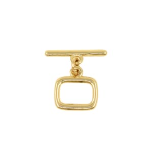 Op de afbeelding: Een goudkleurige toggle sluiting met een rechthoekige lus en een horizontale staaf. De sluiting is ontworpen voor het maken van sieraden en heeft een eenvoudig, elegant ontwerp. Het metaal heeft een glanzende afwerking.