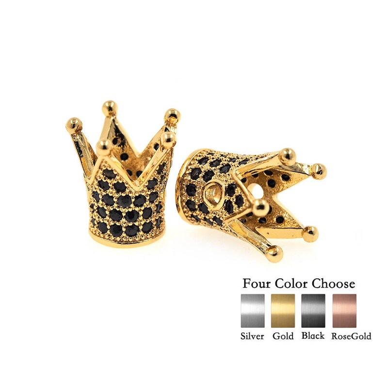 May include: Two gold-tone crown-shaped bead caps with black cubic zirconia stones. Four color options are shown: silver, gold, black, and rose gold.