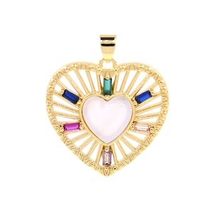 May include: Gold heart-shaped pendant with a white center and colorful gemstones around the edge.