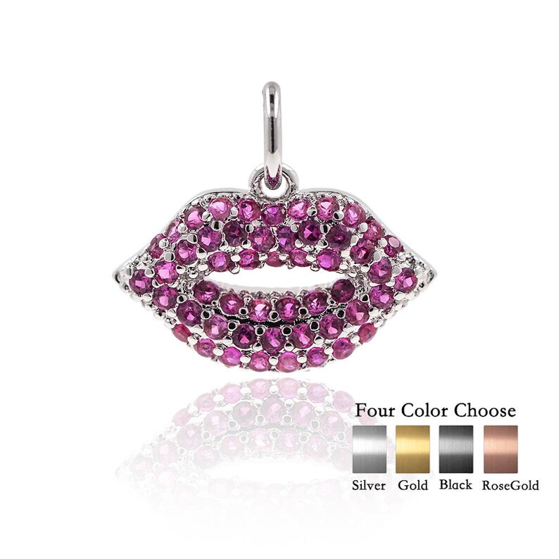 May include: A silver charm pendant in the shape of a pair of lips, encrusted with pink gemstones. Four color options are available: silver, gold, black, and rose gold.
