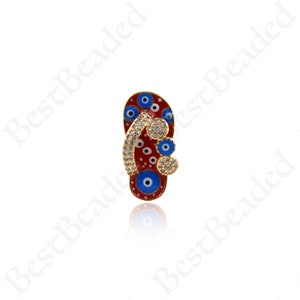 May include: Red and blue enamel flip flop charm with gold accents and white rhinestones. The flip flop has a blue evil eye design.