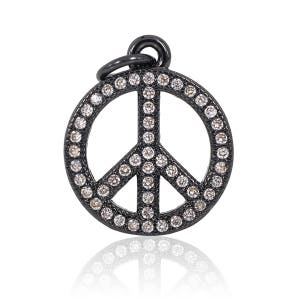 May include: Black peace sign charm with a pave setting of clear round stones.