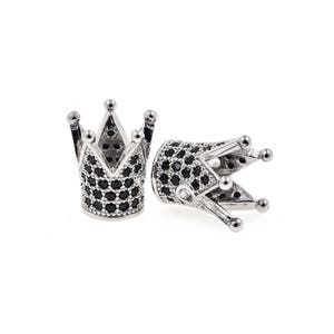 May include: Two silver crown-shaped bead caps with black cubic zirconia stones.