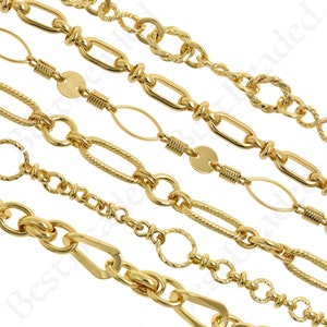 May include: Five gold chains of different styles and sizes. The chains are arranged in a row, with the largest chain at the top and the smallest chain at the bottom.