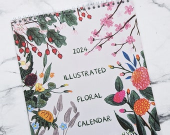 2024 wall calendar with botanical sketches. 12 illustrated pages of frame-able floral art. Limited edition art calendar made in the UK.