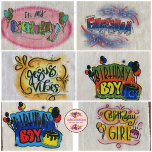 May include: Six different airbrushed designs on white t-shirts. The designs include "It's My Birthday", "Birthday Boy", "Birthday Girl", "Jesus Vibes", "Freedom", and a design with balloons and a cake.