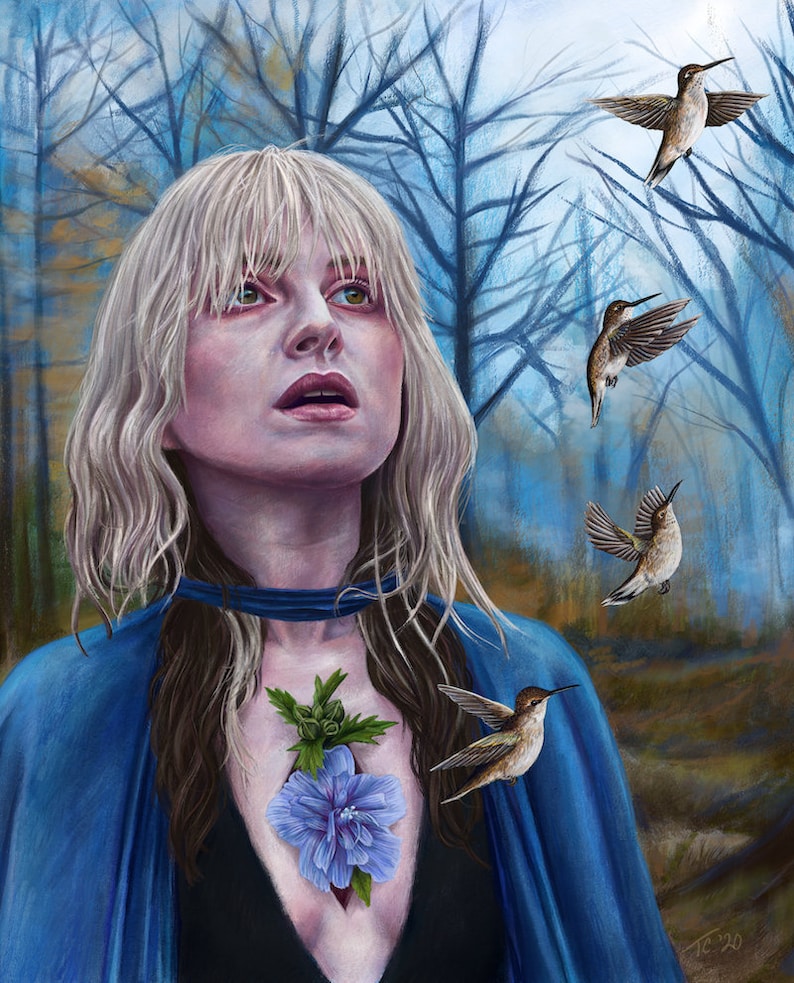 May include: A woman with blonde hair and blue eyes looks up at a flock of hummingbirds flying in a blue and brown forest. A blue flower grows from her chest.