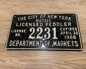 Placa de matrícula vintage de vendedor ambulante de bicicletas de Nueva York de 1968