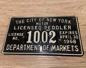 Matrícula vintage de vendedor ambulante de Nueva York de 1968: blanco y negro
