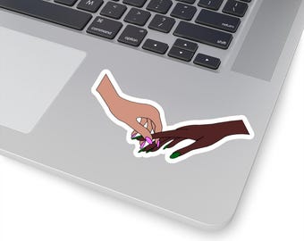 Ariana and Cynthia's Hands Holding Space for Defying Gravity Sticker