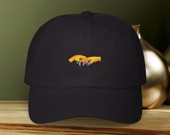 Holding Space for Defying Gravity inspired design on an Embroidered Hat