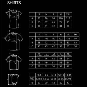 May include: A black and white chart displaying shirt size measurements in centimeters. The chart includes sizes S, M, L, XL, and 2XL, with corresponding measurements for A, B, and C. Also includes baby sizes.
