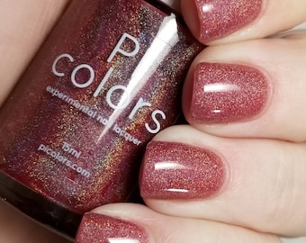 Vernis à ongles rouge avec reflets holographiques Rheum.011