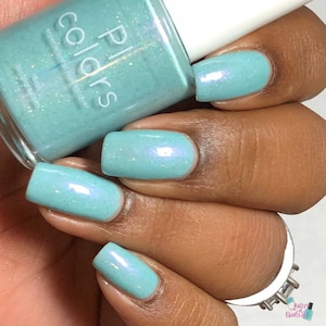 Teal Blue Nail Polish with Holographic Green Glitter and Violet Shimmer | Tiger Lucine.039