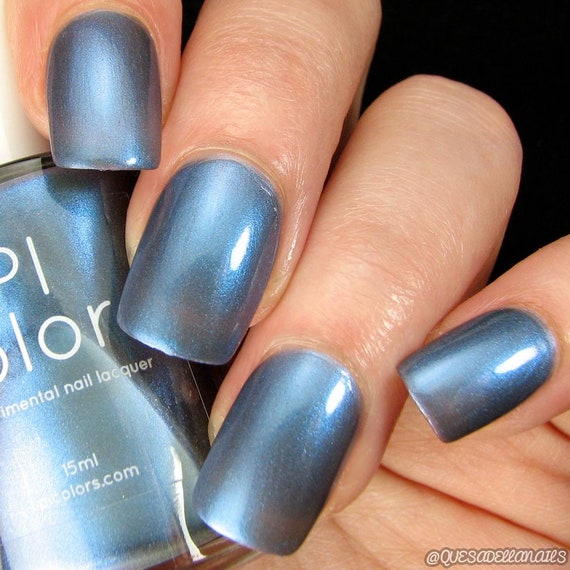 Metallic blue nail polish deals