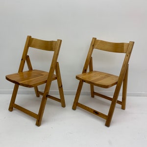 Set of 2 folding chairs pine wood , 1970's