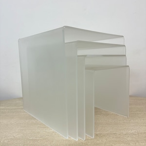 Set of 4 lucite nesting tables, 1970s