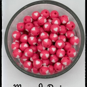 Roze kralen van 12 mm met hartjes