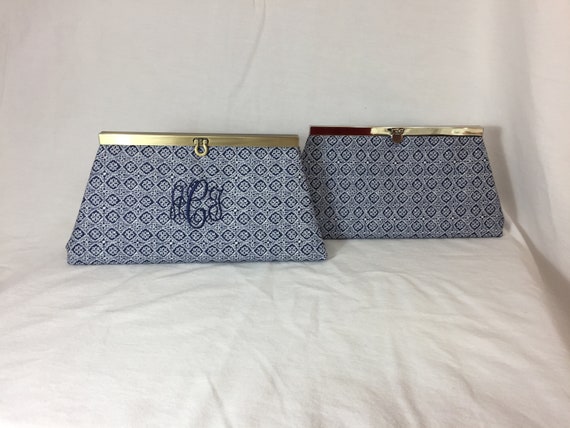 navy and cream clutch bag