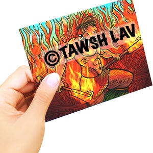 May include: A square print featuring a stylized illustration of a warrior figure with a fiery background. The print has the text "TAWSH LAV" in a bold font. The warrior is depicted holding two wooden staffs.