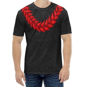 May include: A black t-shirt with a red lei design. The lei is made of red flowers and leaves. The shirt has a black and white patterned background.
