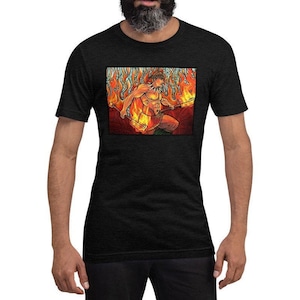 May include: A black t-shirt with a graphic print of a person in a fiery landscape. The person is holding a staff and has a crown of flames on their head.