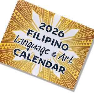 May include: A 2026 Filipino Language & Art Calendar. The calendar features a white background with the text "2026 FILIPINO Language & Art CALENDAR" in navy blue. The border is a gold and brown sunburst design with geometric patterns.