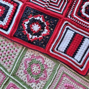 May include: A crocheted blanket with a patchwork design featuring squares in red, black, white, and green. The squares are stitched together to create a colorful and textured pattern.